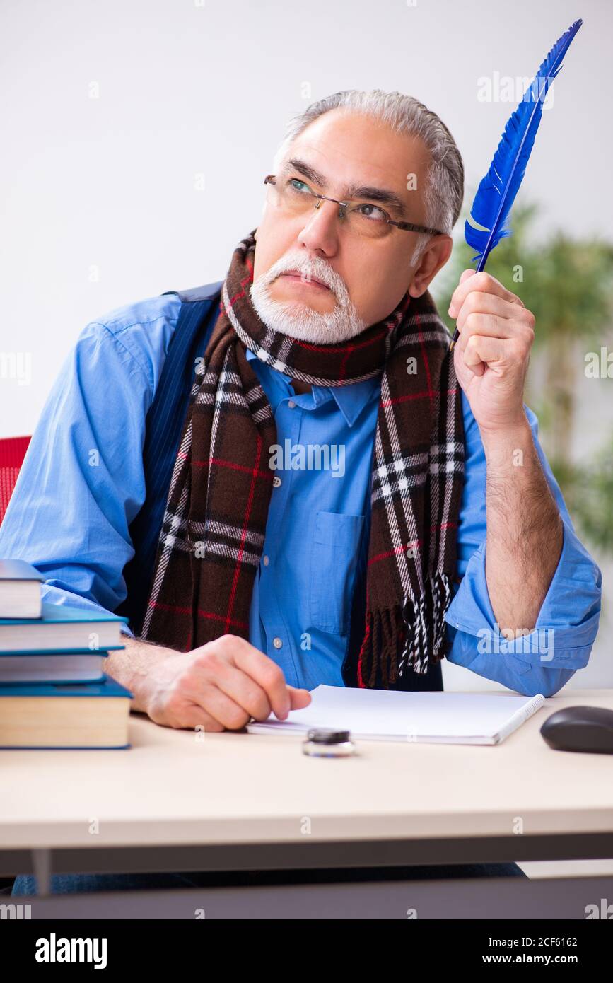 Man Write Books Male author feather writing hi-res stock photography and images - Alamy