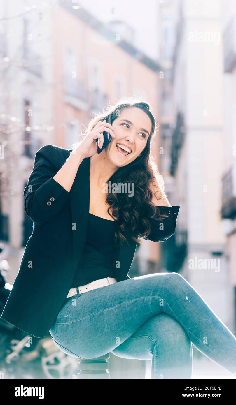 Smiling woman talking walking hi-res stock photography and images - Alamy