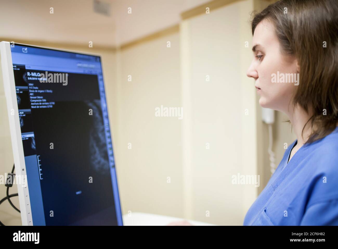Female doctor using digital equipment for mammography Stock Photo