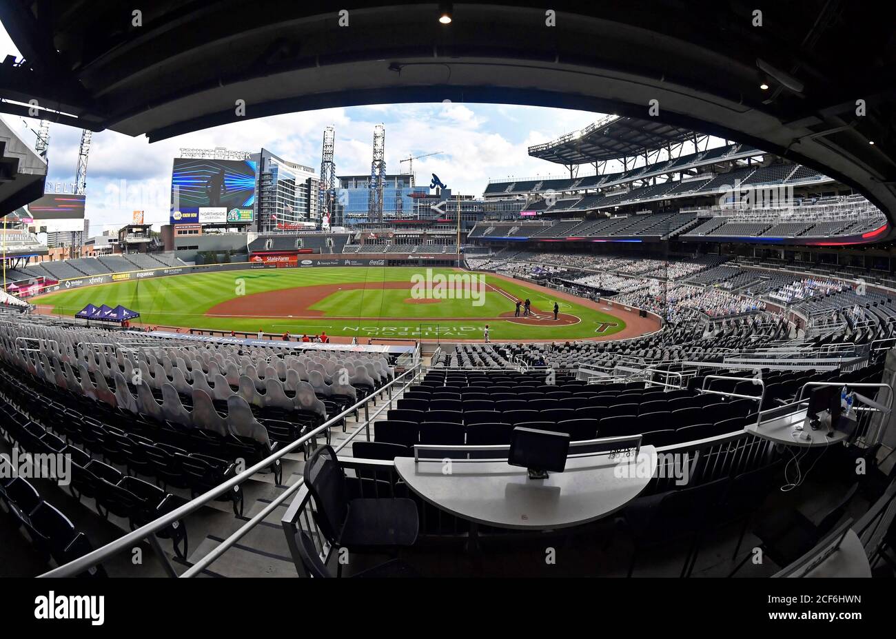 August 22, 2020 Several umpires meet at home plate in an empty stadium