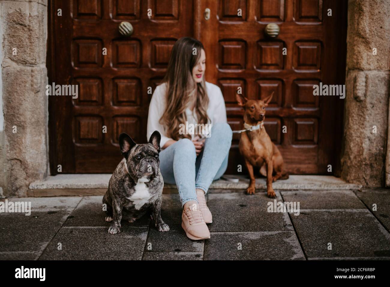 Woman sitting on her porch hi-res stock photography and images - Alamy
