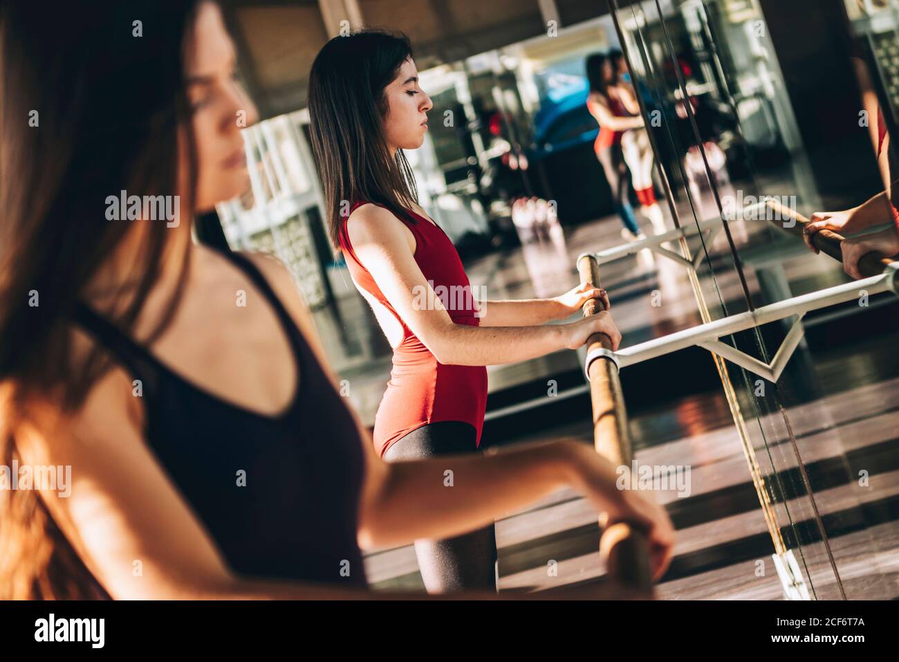 Young ballet dancer working out in studio Stock Photo