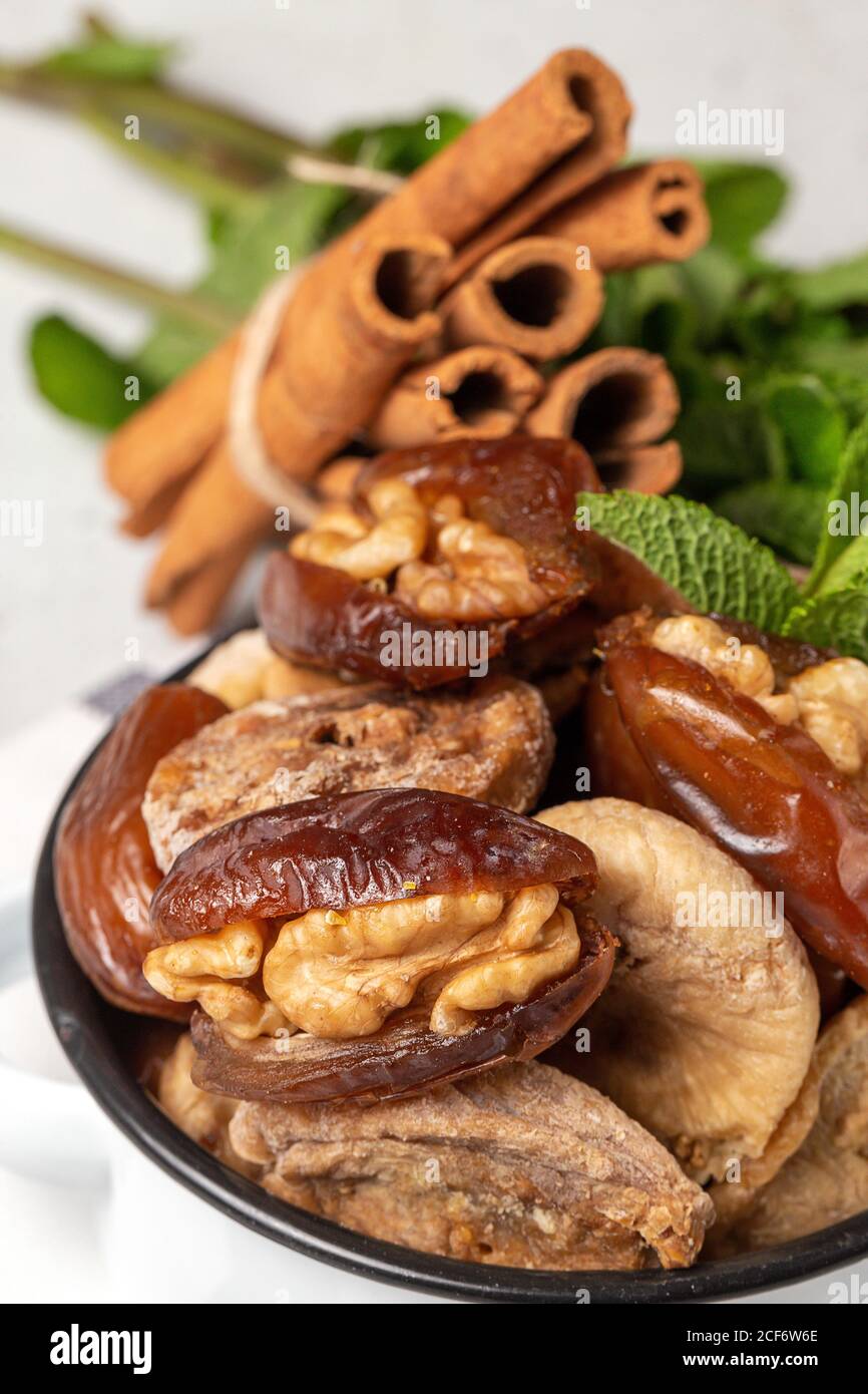 Dates fruits with walnut sand dried figs, mint and cinnamon muslim
