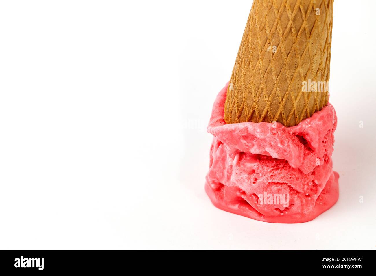 Dropped melting ice cream cone Stock Photo