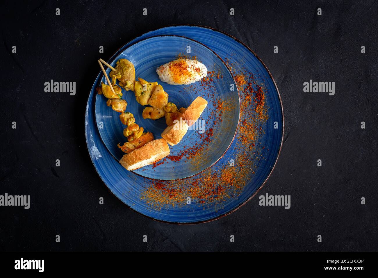 Homemade Moorish skewers with rice of meat with spices. Typical ...