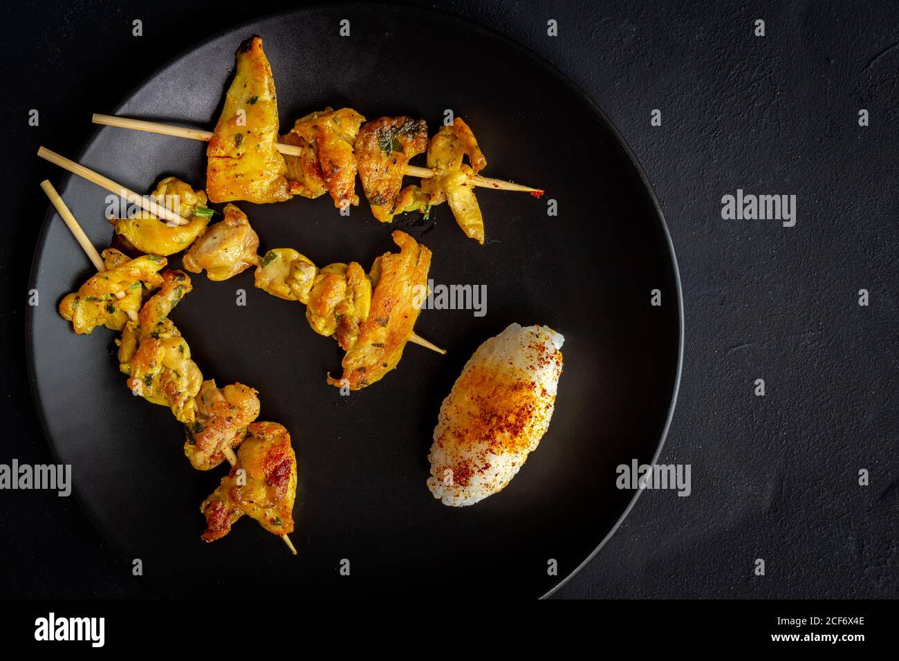 Homemade Moorish skewers with rice of meat with spices. Typical ...