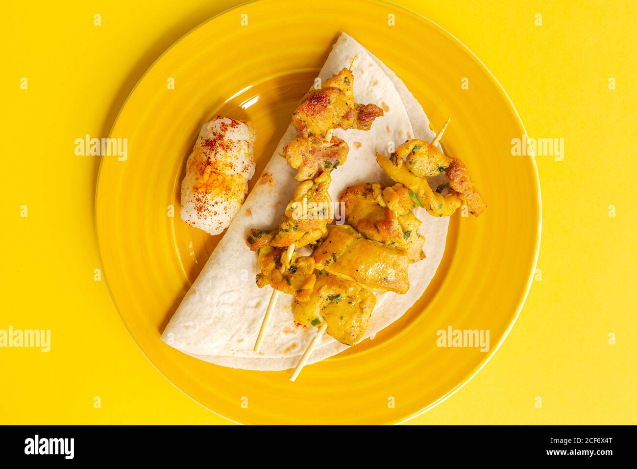 Homemade Moorish skewers with rice of meat with spices. Typical ...