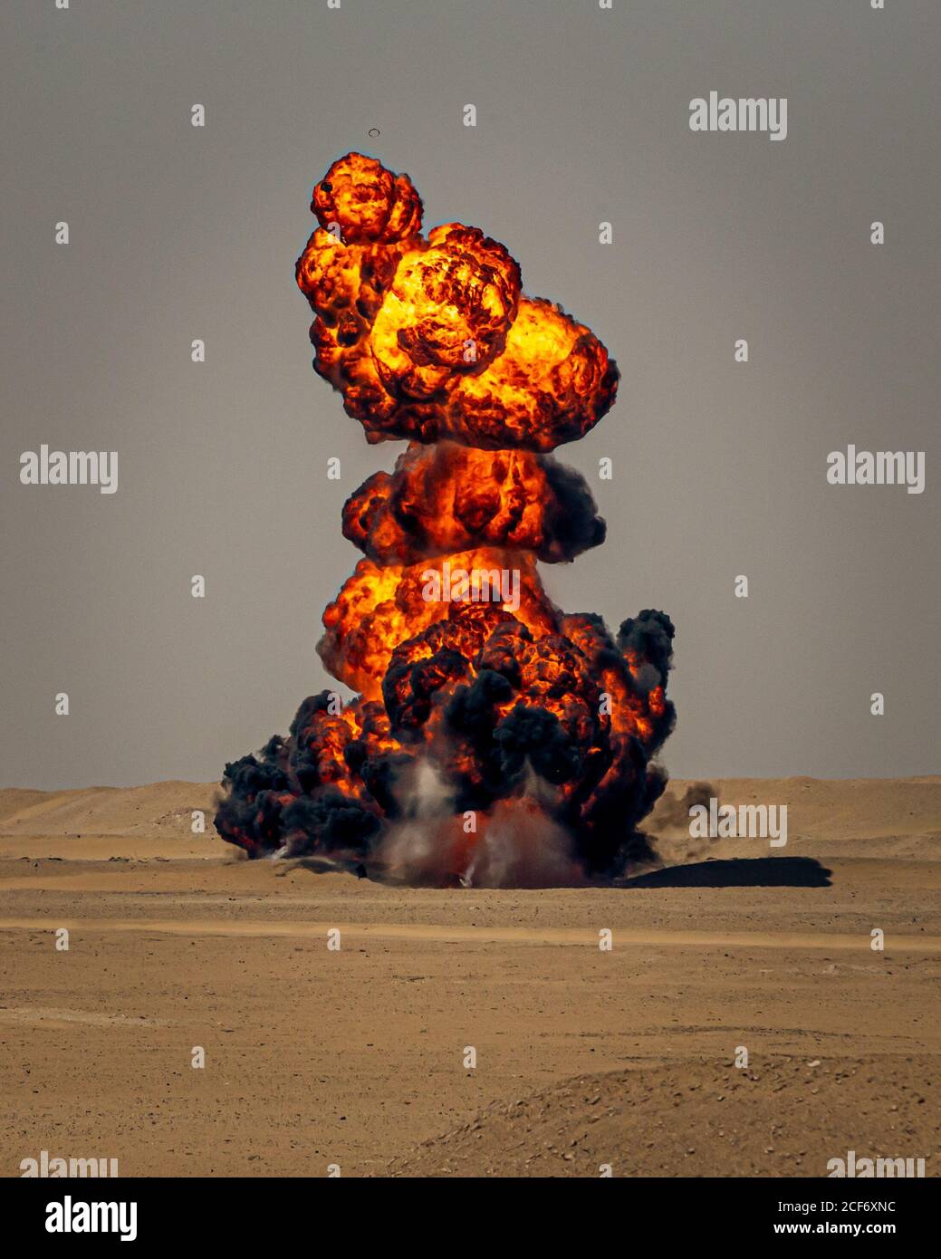 U.S. Marines with Special Purpose Marine Air-Ground Task Force Crisis Response - Central Command 20.2, detonate a flame fougasse during a demolition range in Kuwait, Sept. 1, 2020. Combat engineers conducted the demolition range to stay proficient in all areas of their military occupational specialty and to maintain mission readiness. The SPMAGTF-CR-CC is a crisis response force, prepared to deploy a variety of capabilities across the region. (U.S. Marine Corps photo Lance Cpl. Andrew Skiver) Stock Photo