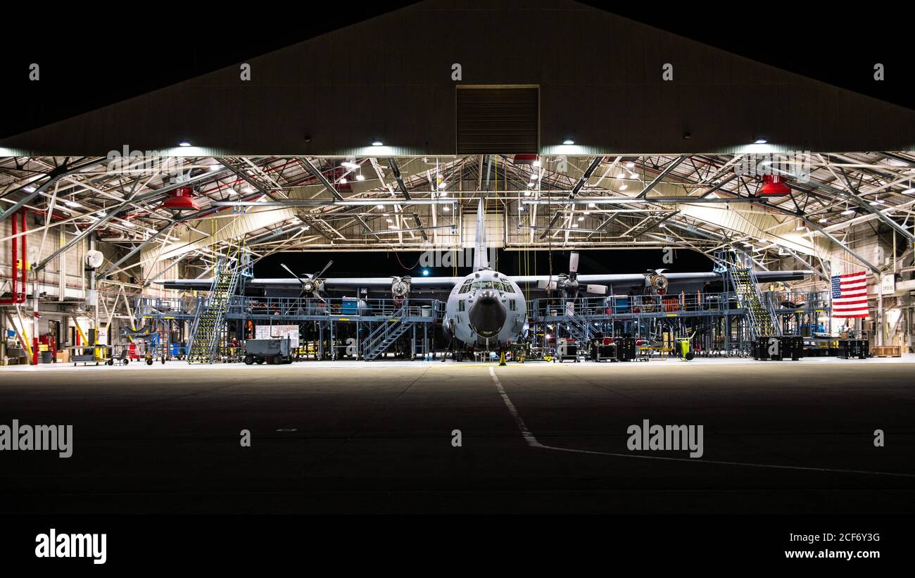 A U.S. Air Force C-130H Hercules aircraft, assigned to the 180th Airlift Squadron, Missouri Air National Guard, sets in a maintenance hangar at Rosecrans Air National Guard Base, in St. Joseph, Missouri, August 27, 2020. The C-130 Hercules primarily performs the tactical portion of the airlift mission, fulfilling a wide range of operational missions in both peace and war situations. The Missouri Air National Guard’s 139th Airlift Wing is comprised of approximately 1,200 citizen-Airmen from local communities throughout the region. The unit operates the C-130H Hercules cargo aircraft and has a d Stock Photo