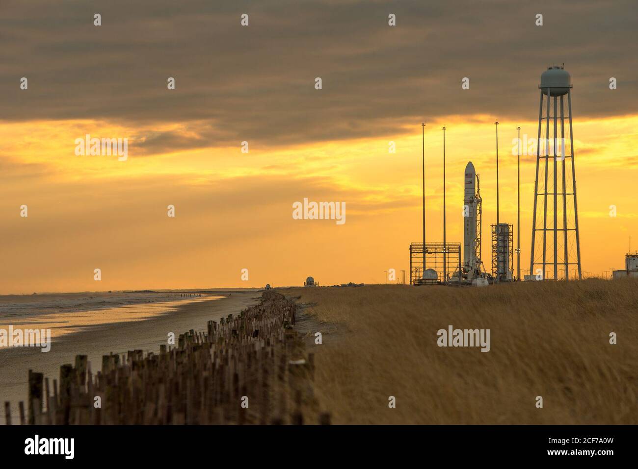 An Orbital Sciences Corporation Antares rocket is seen on launch Pad-0A at NASA's Wallops Flight Facility, Monday, January 6, 2014 in advance of a planned Wednesday, Jan. 8th, 1:32 p.m. EST launch, Wallops Island, VA. The Antares will launch a Cygnus spacecraft on a cargo resupply mission to the International Space Station. The Orbital-1 mission is Orbital Sciences' first contracted cargo delivery flight to the space station for NASA. Among the cargo aboard Cygnus set to launch to the space station are science experiments, crew provisions, spare parts and other hardware.   More info: http://1. Stock Photo