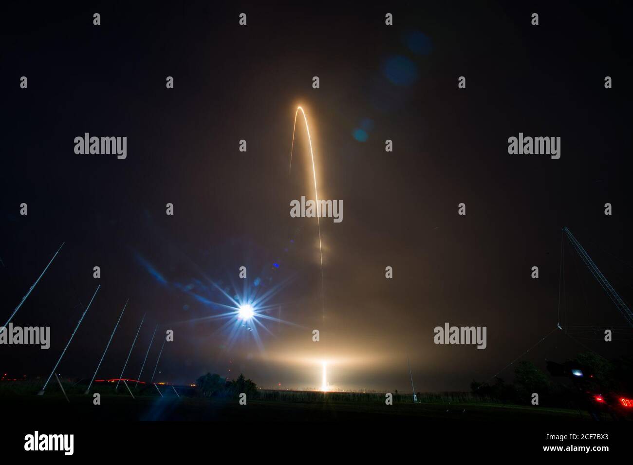 The Orbital ATK Antares rocket, with the Cygnus spacecraft onboard, launches from Pad-0A, Monday, May 21, 2018 at NASA's Wallops Flight Facility in Virginia. Orbital ATK’s ninth contracted cargo resupply mission with NASA to the International Space Station will deliver approximately 7,400 pounds of science and research, crew supplies and vehicle hardware to the orbital laboratory and its crew. Photo Credit: (NASA/Aubrey Gemignani) Stock Photo