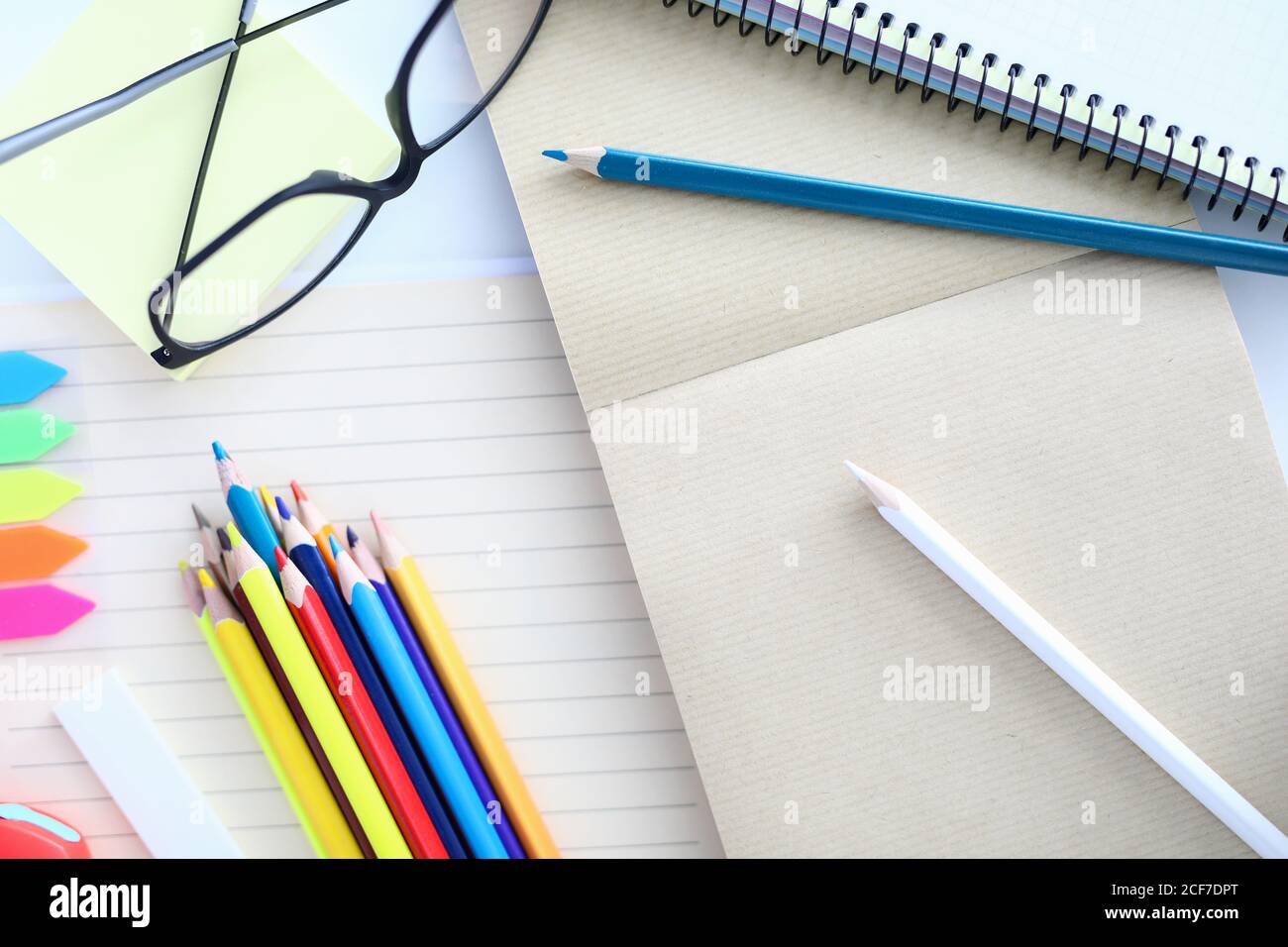 Close-up colored pencils for drawing white sheets Stock Photo