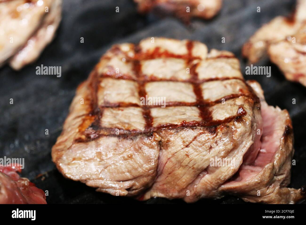 Steak on the grill with a lozenge pattern Stock Photo