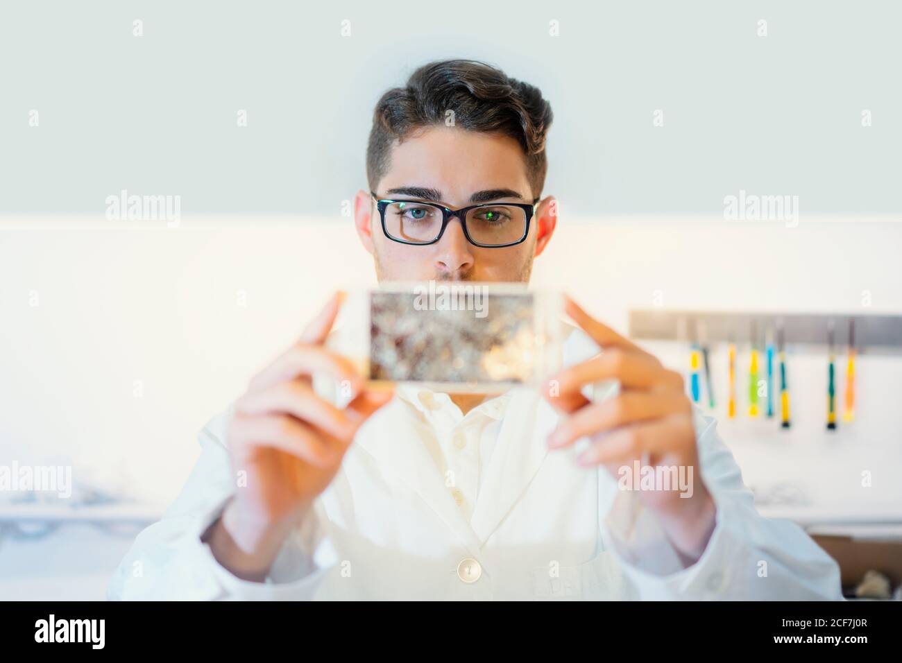 Man showing broken smartphone display Stock Photo