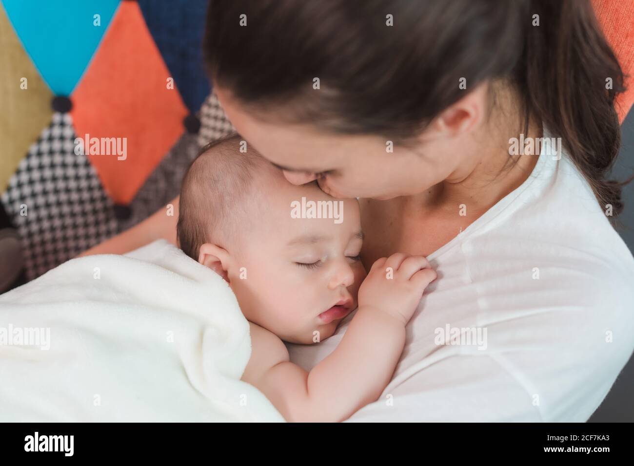 Baby sleeping on mom chest hi-res stock photography and images - Alamy