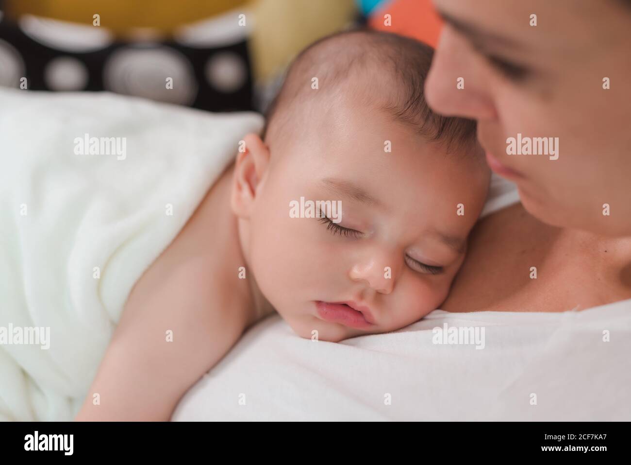 Baby sleeping on mom chest hires stock photography and images Alamy
