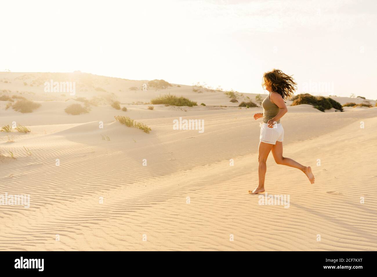 Barefoot woman in desert hi-res stock photography and images - Alamy