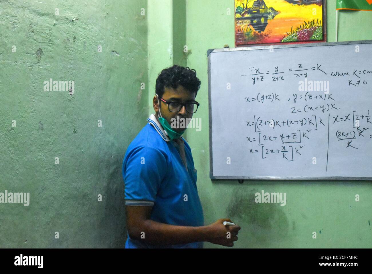 kolkata-india-03rd-sep-2020-koustav-kanjilal-a-math-teacher-taking-mathematics-class-on-his-tuition-centre-during-the-unlock-stage-40-in-kolkata-for-covid-19-pandemic-schools-are-closed-but-students-doing-online-class-taking-private-tuition-and-maintaining-all-safety-norms-photo-by-sudipta-daspacific-press-credit-pacific-press-media-production-corpalamy-live-news-2CF7MHC.jpg