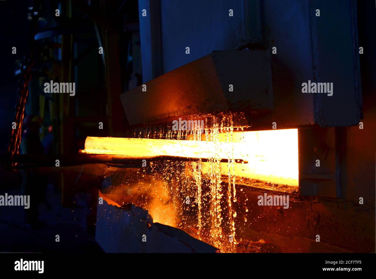 Steel quenching at high temperature in industrial furnace at the