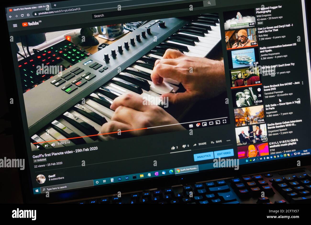 Watching a YouTube video on a PC computer monitor by streaming video over the Internet Stock Photo