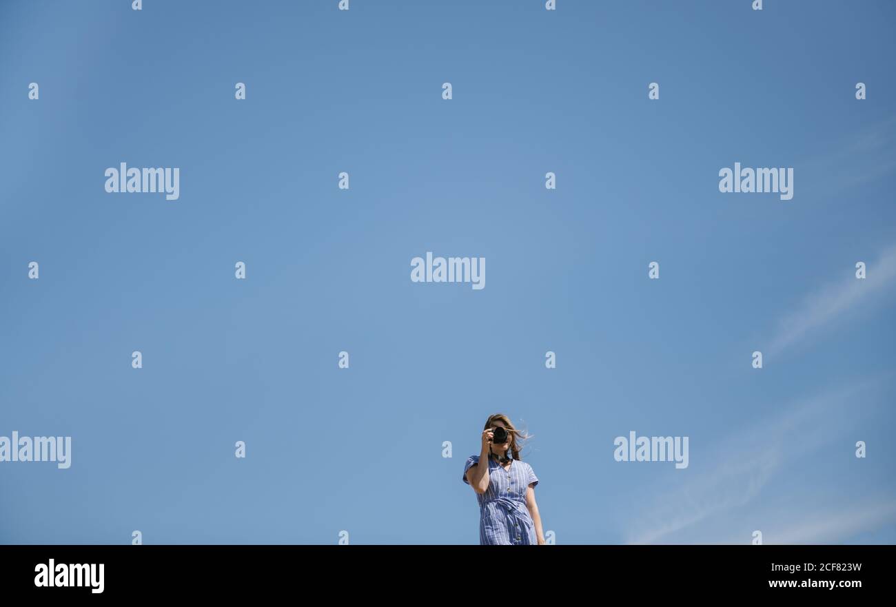 Woman windy day dress hi-res stock photography and images - Alamy