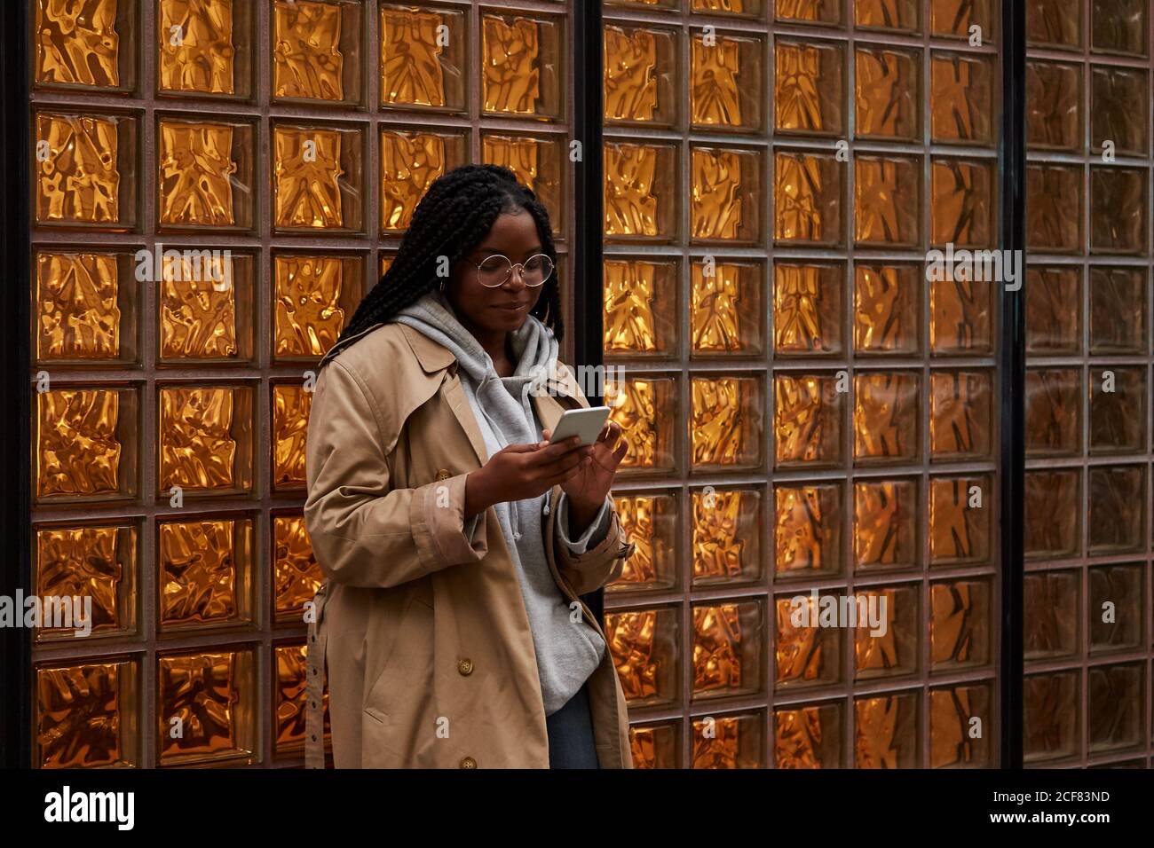 Confident woman braids glasses hi-res stock photography and images - Alamy