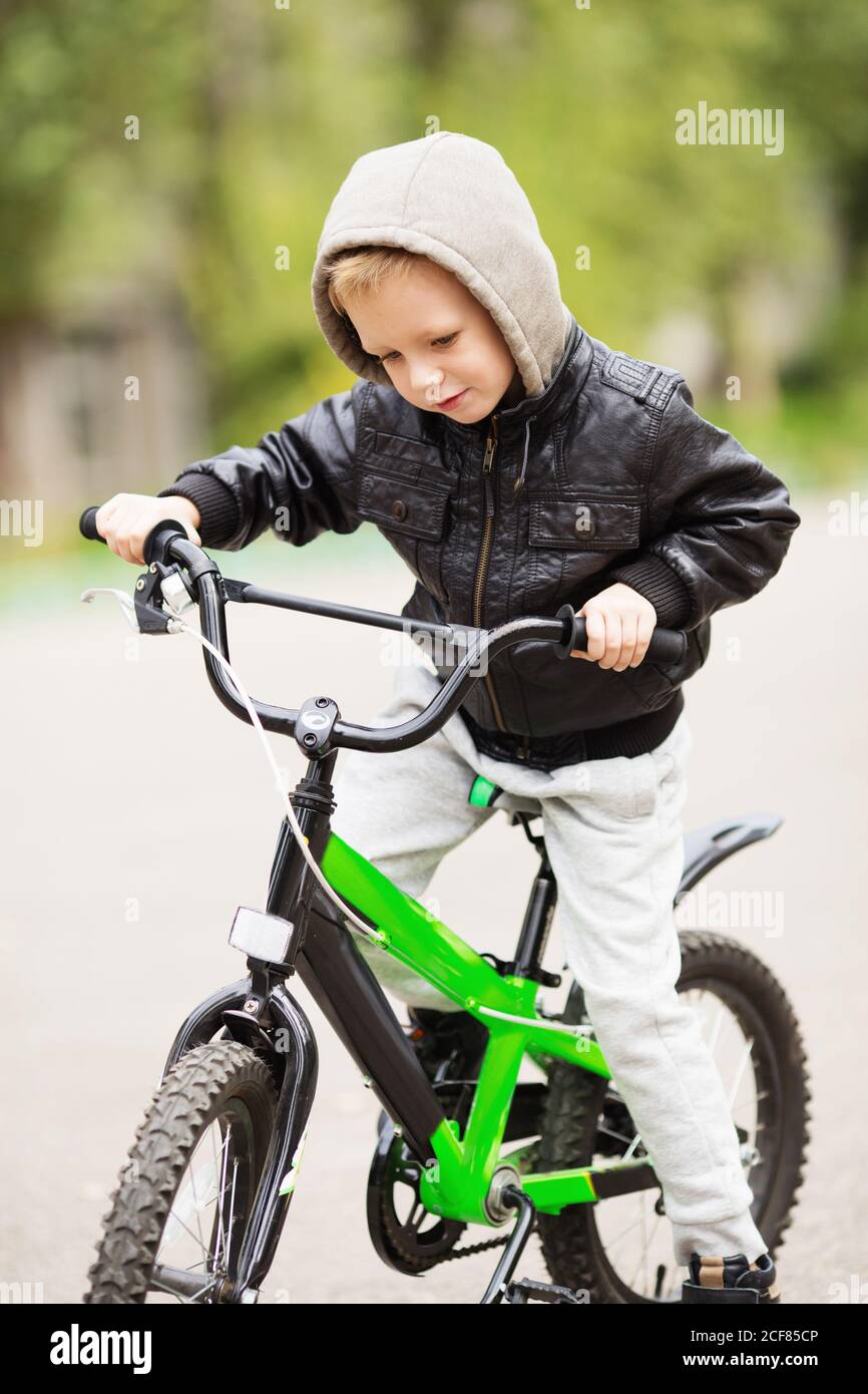 Child driving bicycle hi res stock photography and images Page 8 Alamy