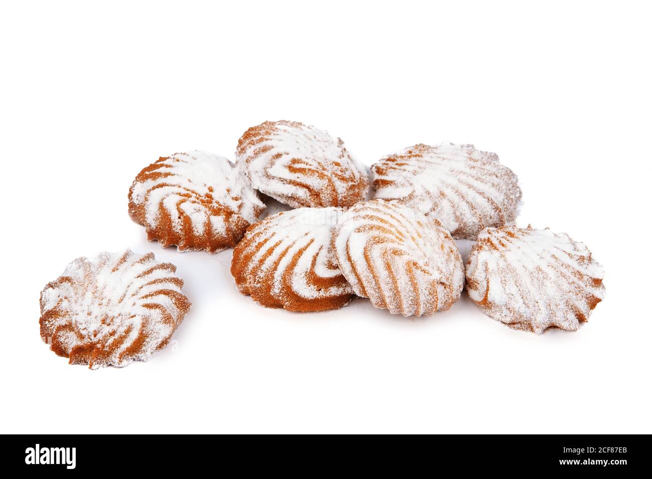 several mouthwatering shortbread cookies with powdered sugar isolated