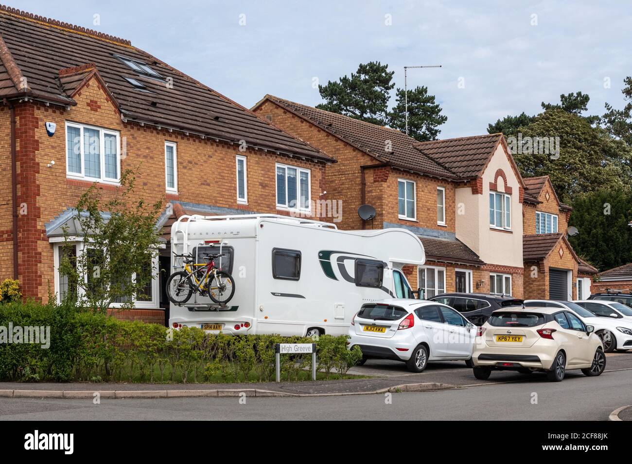 The popularity of motorhomes during the pandemic has caused owners to be inventive with how and where they are parked, Northamptonshire, UK Stock Photo