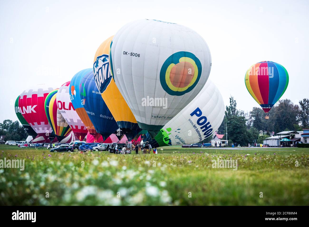 The "25 Balloons above Rozkos Lake" balloon fiesta continued with Friday's  morning start from the airport in Jaromer, Czech Republic, on September 4  Stock Photo - Alamy