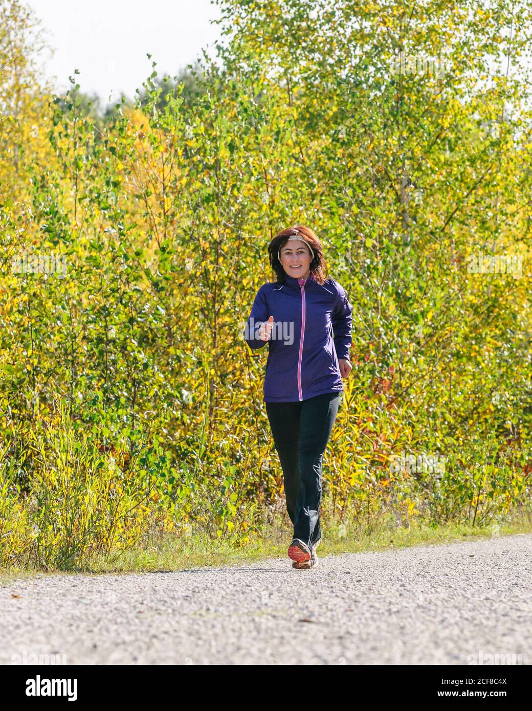 Woman powerful walking hi-res stock photography and images - Alamy