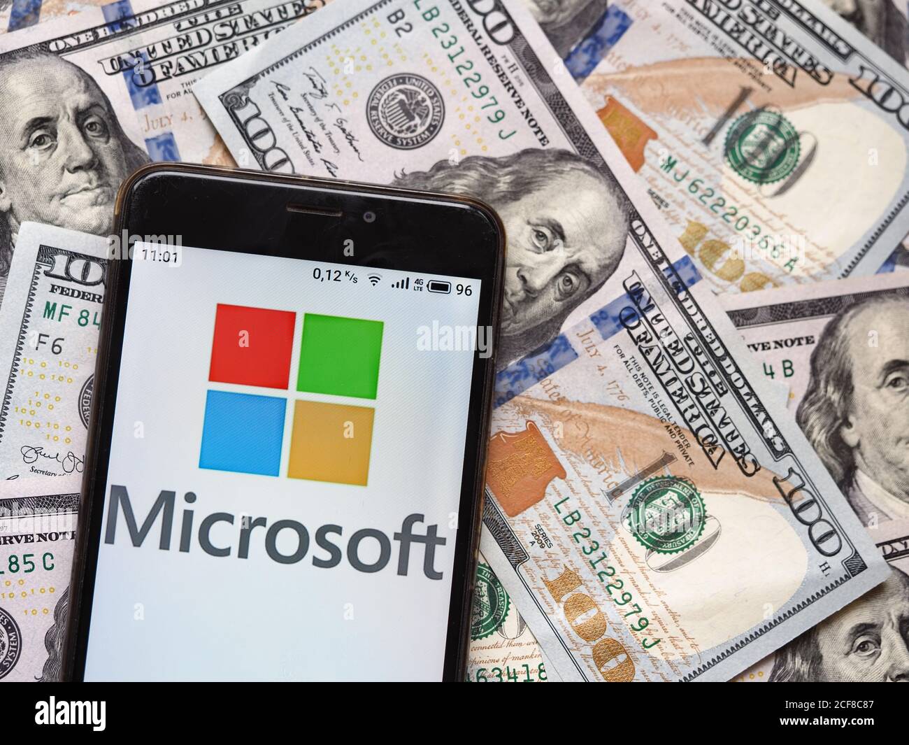 In this photo illustration a Microsoft logo is seen displayed on a ...