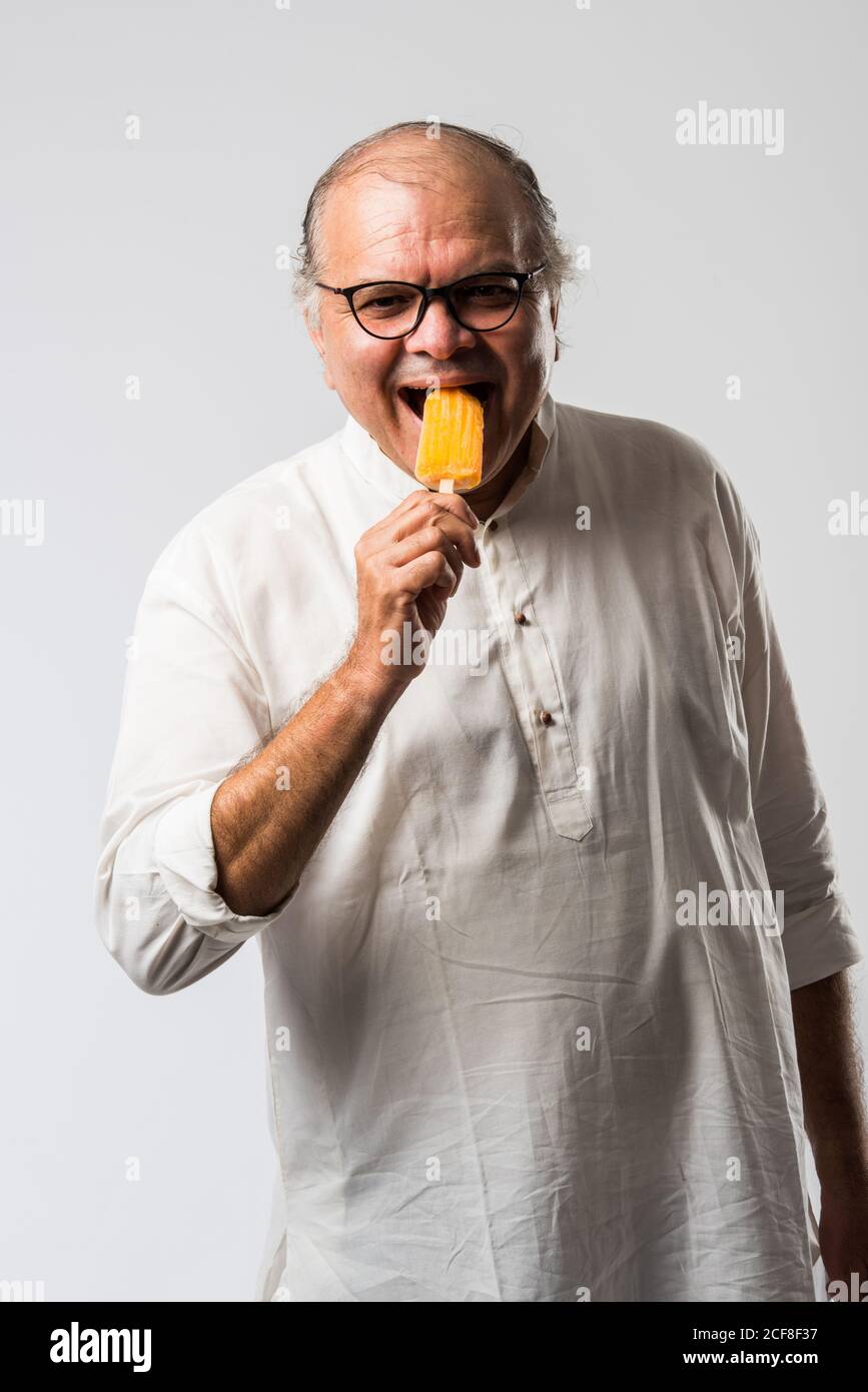Old Man Eating Ice Cream High Resolution Stock Photography And Images Alamy
