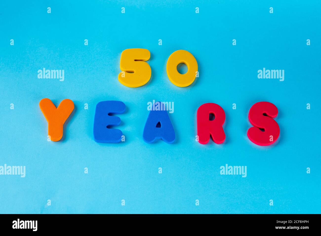 50 years old celebrating classic logo. Colored happy anniversary 50 th