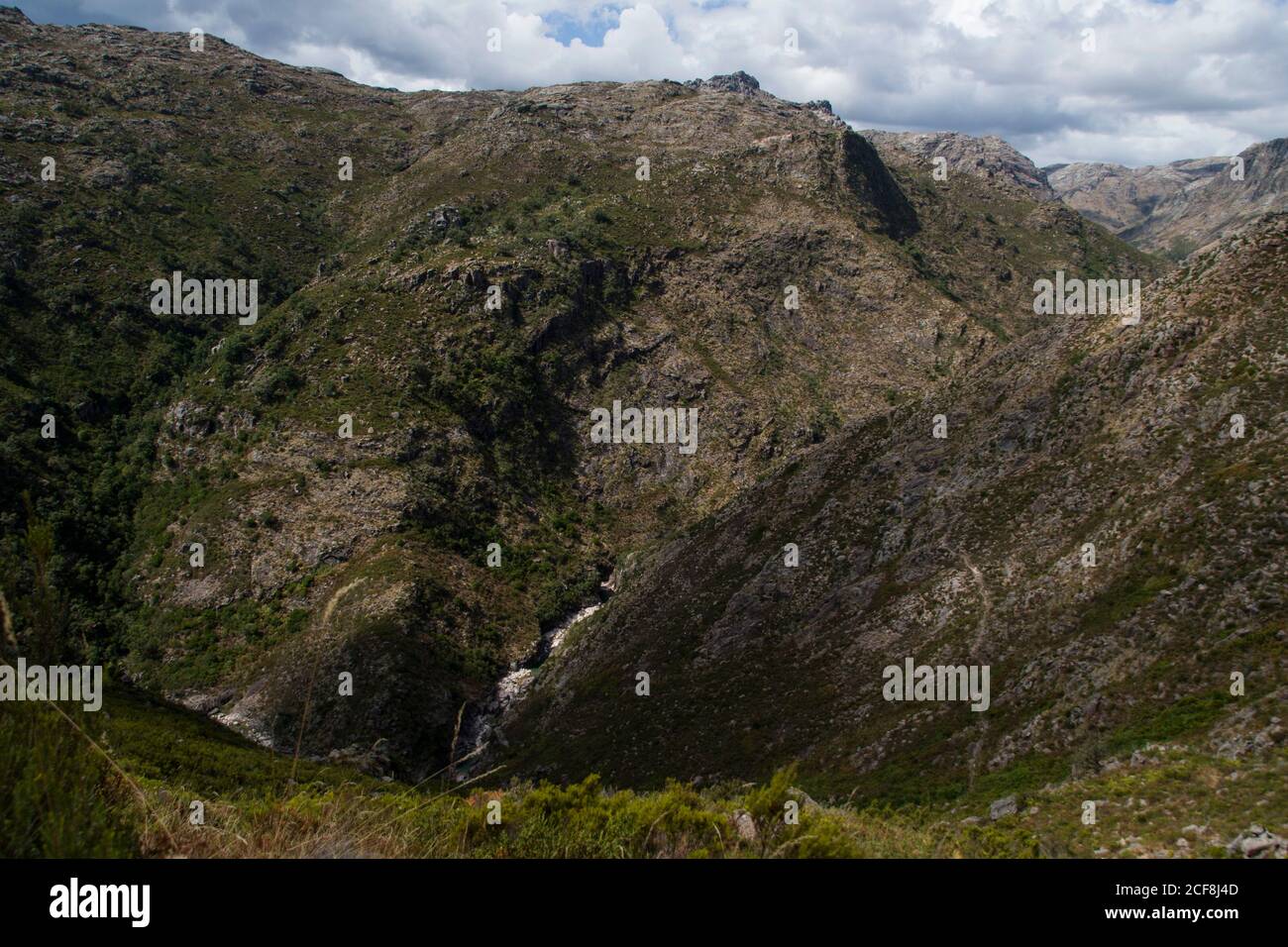 A deep valley between high mountains seen from above Stock Photo Alamy