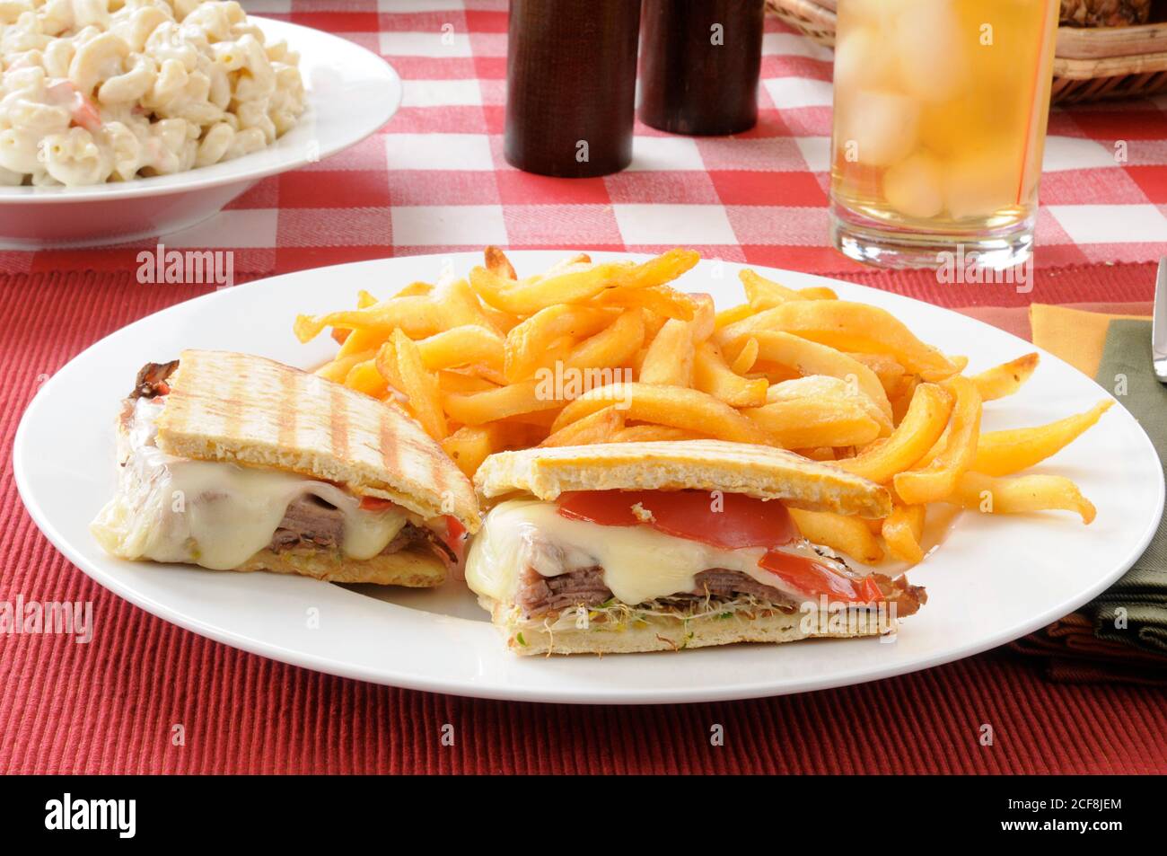 A roast beef panini with fries and macaroni salad Stock Photo Alamy