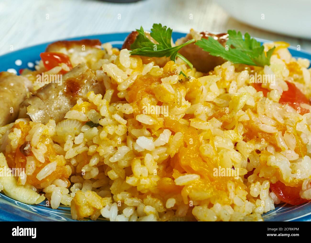 Sausage squash risotto chopped butternut squash and chipolata sausages Stock Photo Alamy