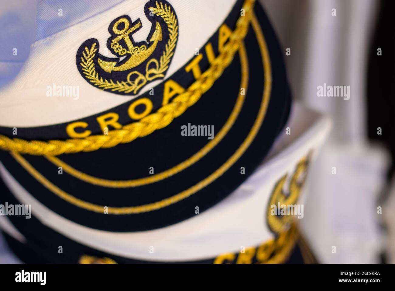 Traditional white sailors hat with the inscription Croatia. Anchor symbol representing the naval