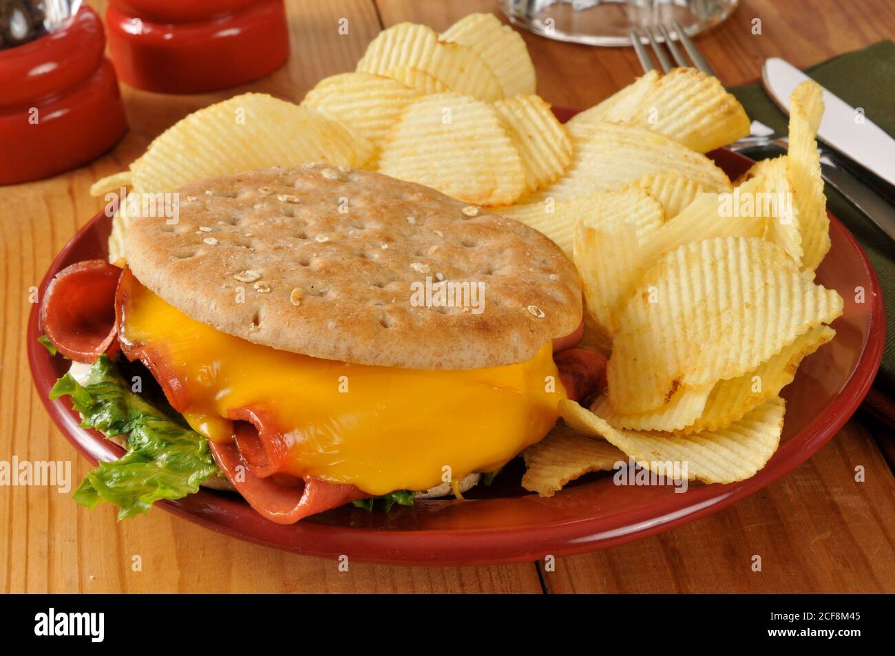 A fried bologna sandwich with potato chips Stock Photo Alamy