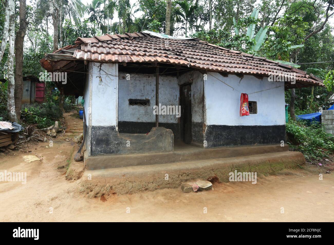 PANIYAN TRIBE, Traditional House at Chulliyod Village, Vannathara