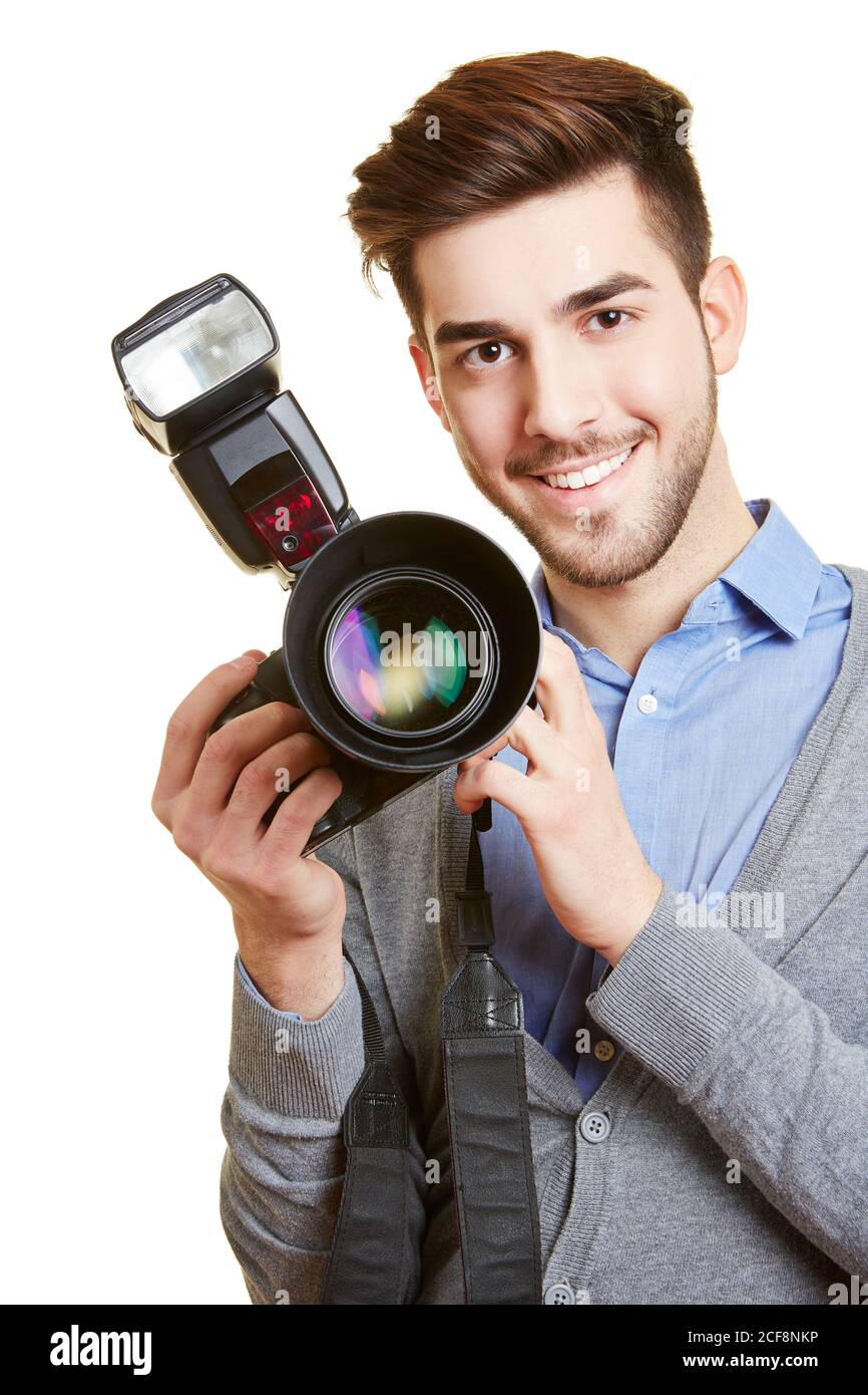 Photographer with professional camera and flash in hand Stock Photo Alamy
