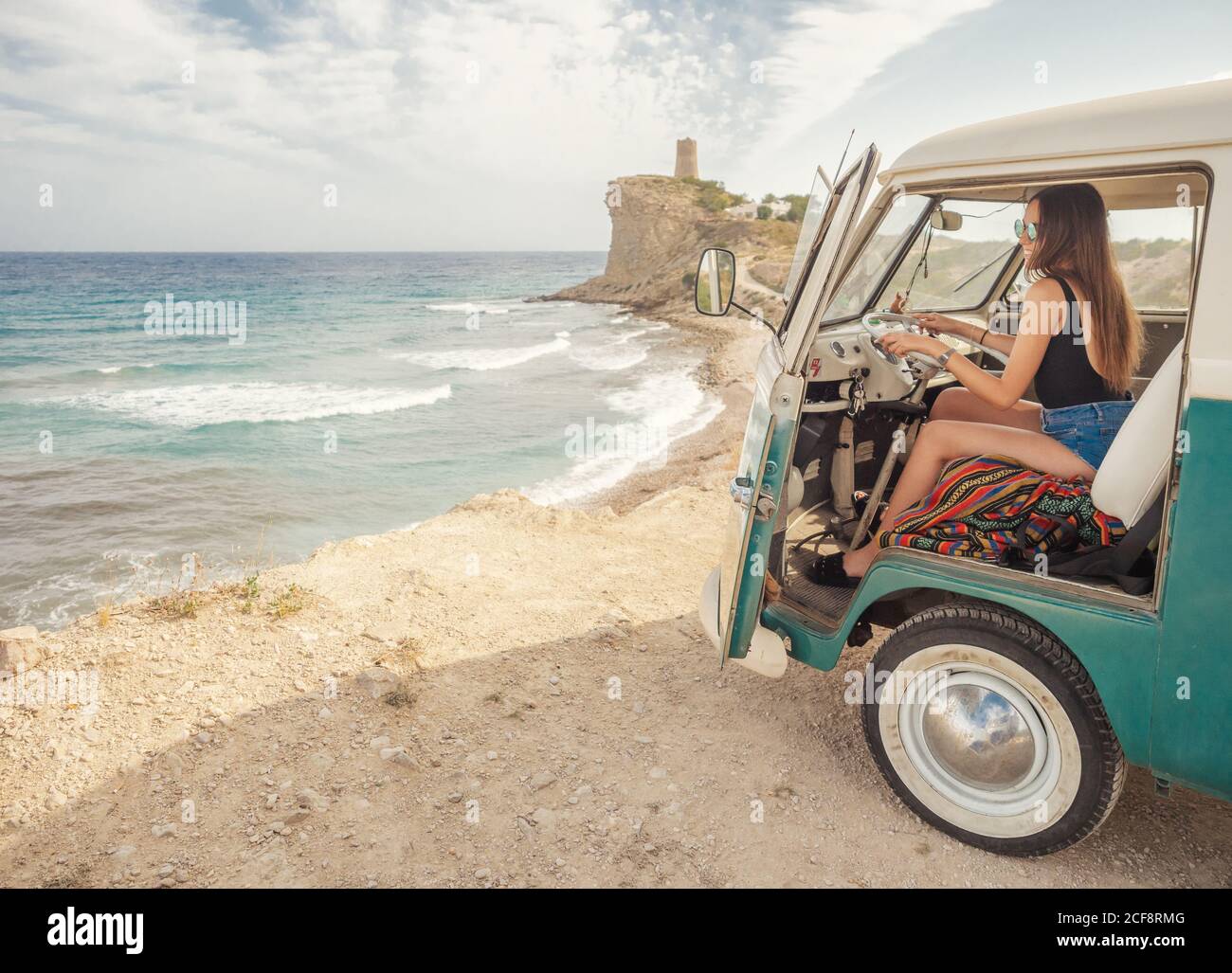 Side View Of Car With Open Door And Woman Drawing On Sandy Empty Beach With Foamy Waves In Bright Sunny Day Stock Photo Alamy