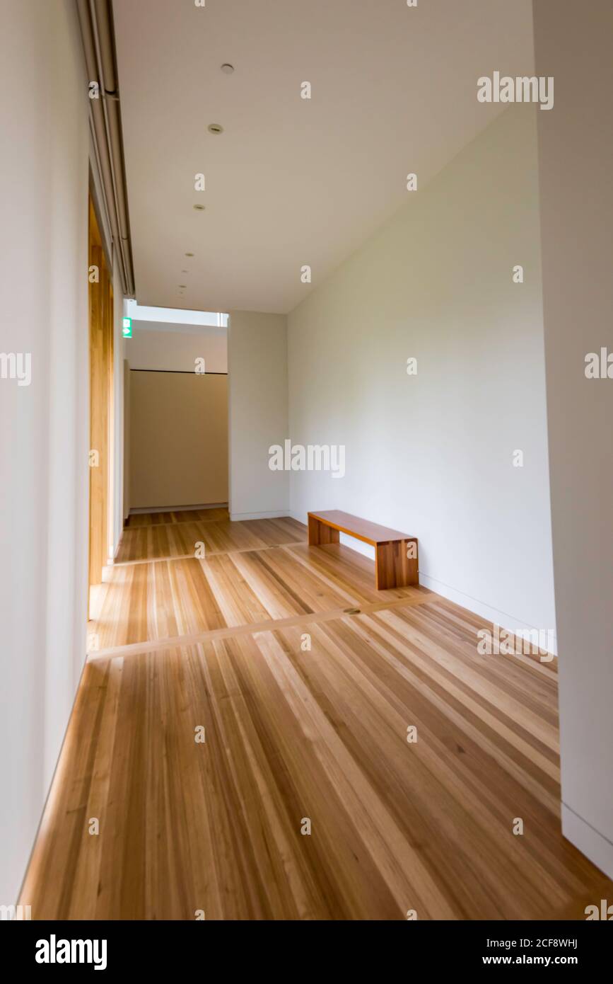 A timber floored access corridor in the Johnson Pilton Walker designed National Portrait Gallery in Canberra, ACT, Australia Stock Photo
