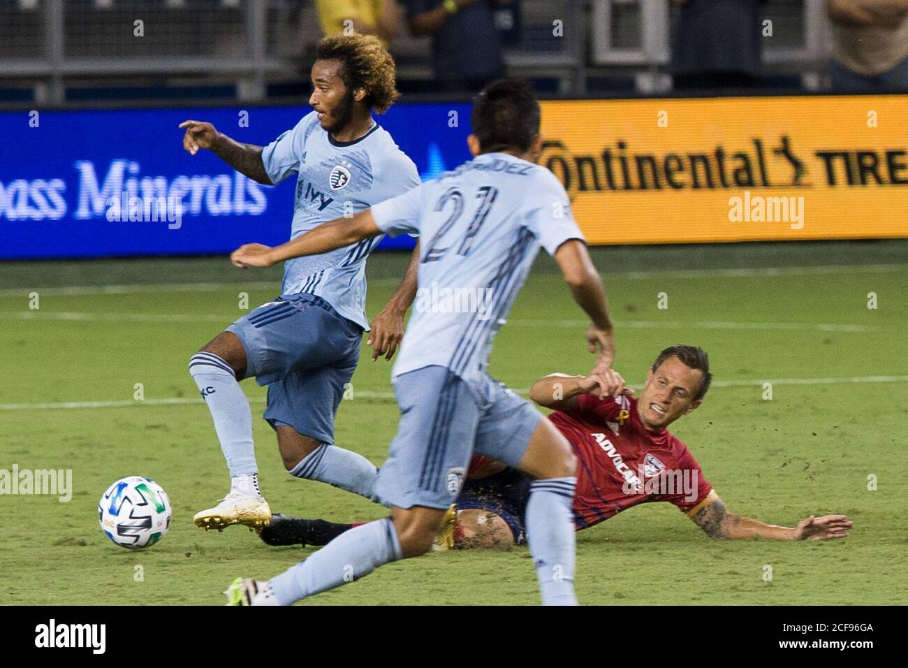 September 2, 2020, Kansas City, Kansas, U.S: Sporting KC midfielder/forward Gianluca Busio #27 (l) pushes through the defensive tackle of FC Dallas defender Reto Ziegler #3 (r) during the second half of the game. (Credit Image: © Serena S.Y. Hsu/ZUMA Wire) Stock Photo