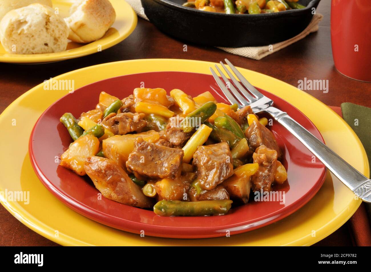 Braised beef and potatoes with green and yellow beans Stock Photo Alamy