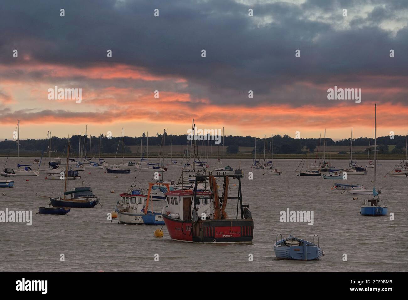 Felixstowe Ferry Suffolk's quirky 'olde World' fishing village viewed as the sun rises Stock Photo