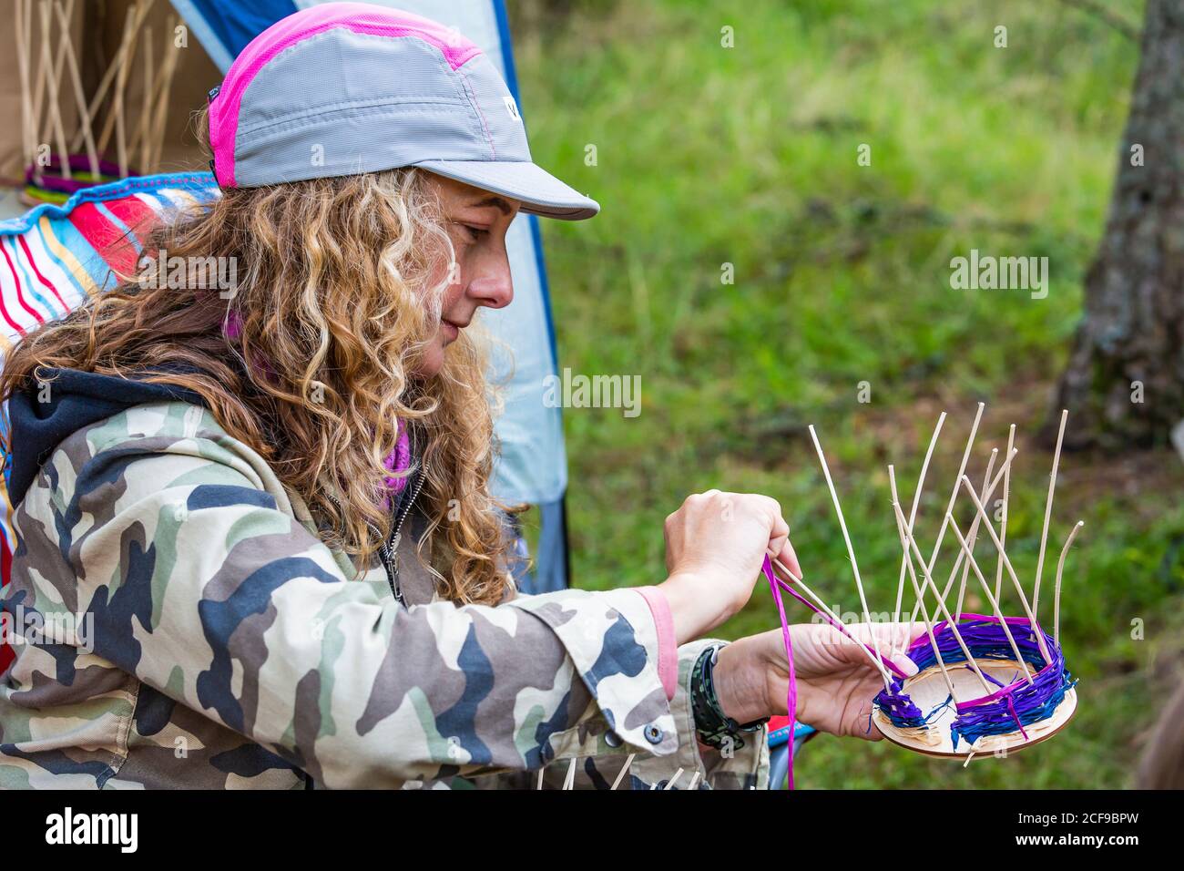 Basket weaving workshop at We Are Not a Festival socially distanced event in Pippingford Park - camping with a festival vibe Stock Photo