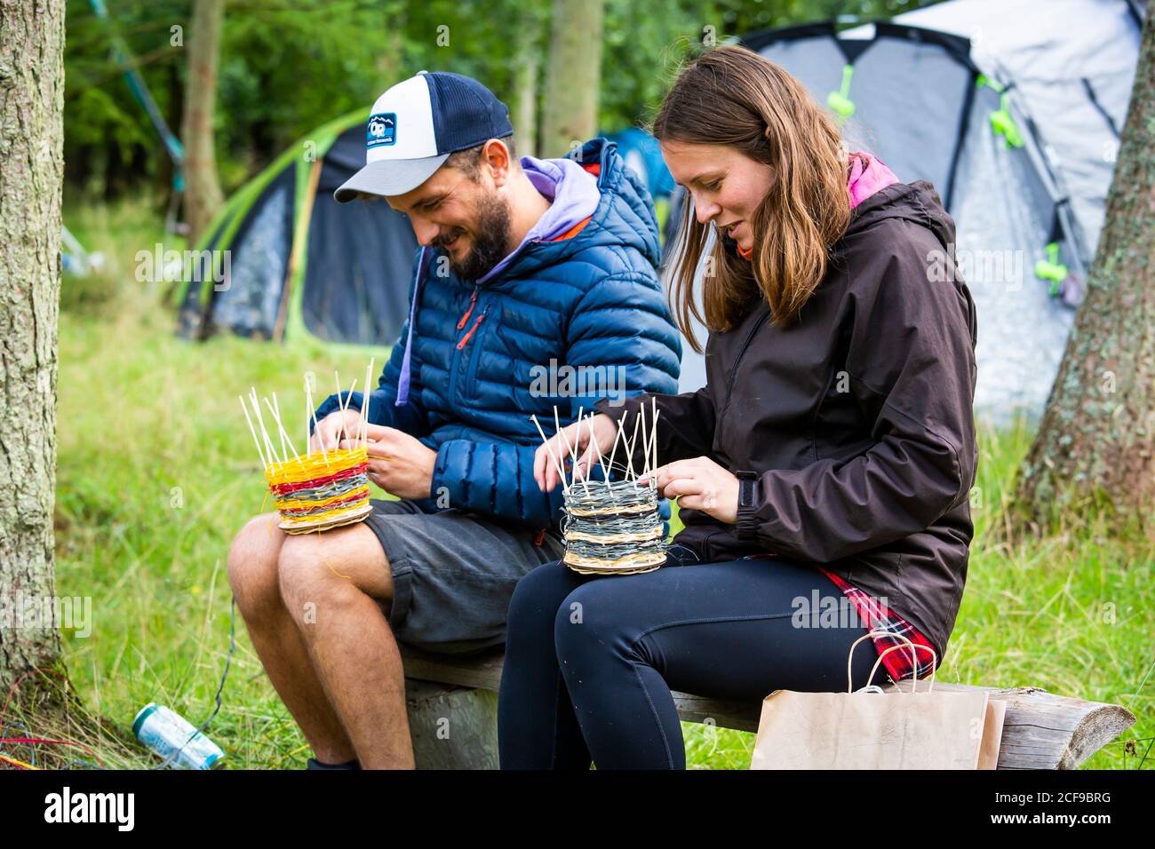 Basket weaving workshop at We Are Not a Festival socially distanced event in Pippingford Park - camping with a festival vibe Stock Photo
