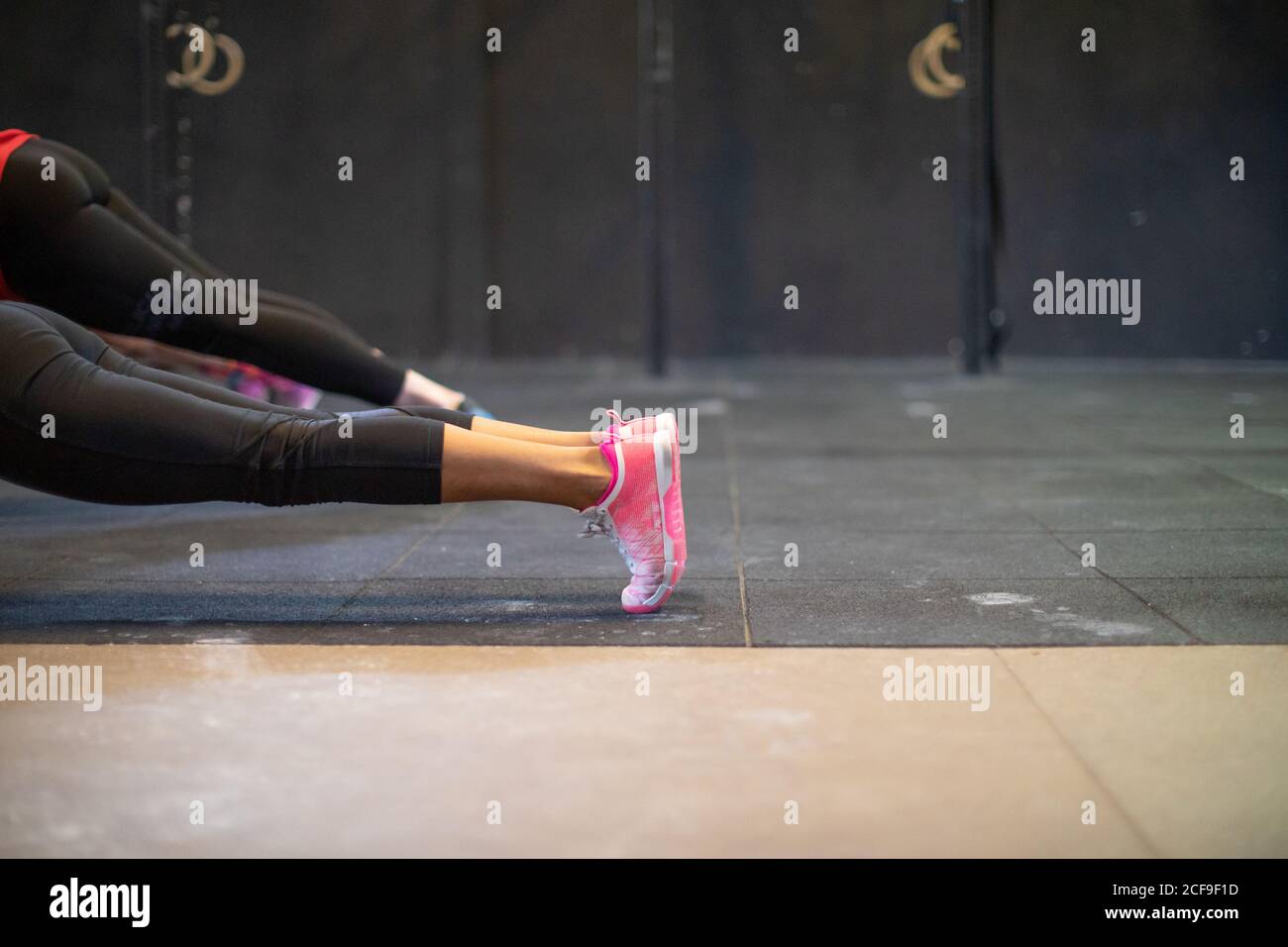 Fit Woman doing push-ups Stock Photo
