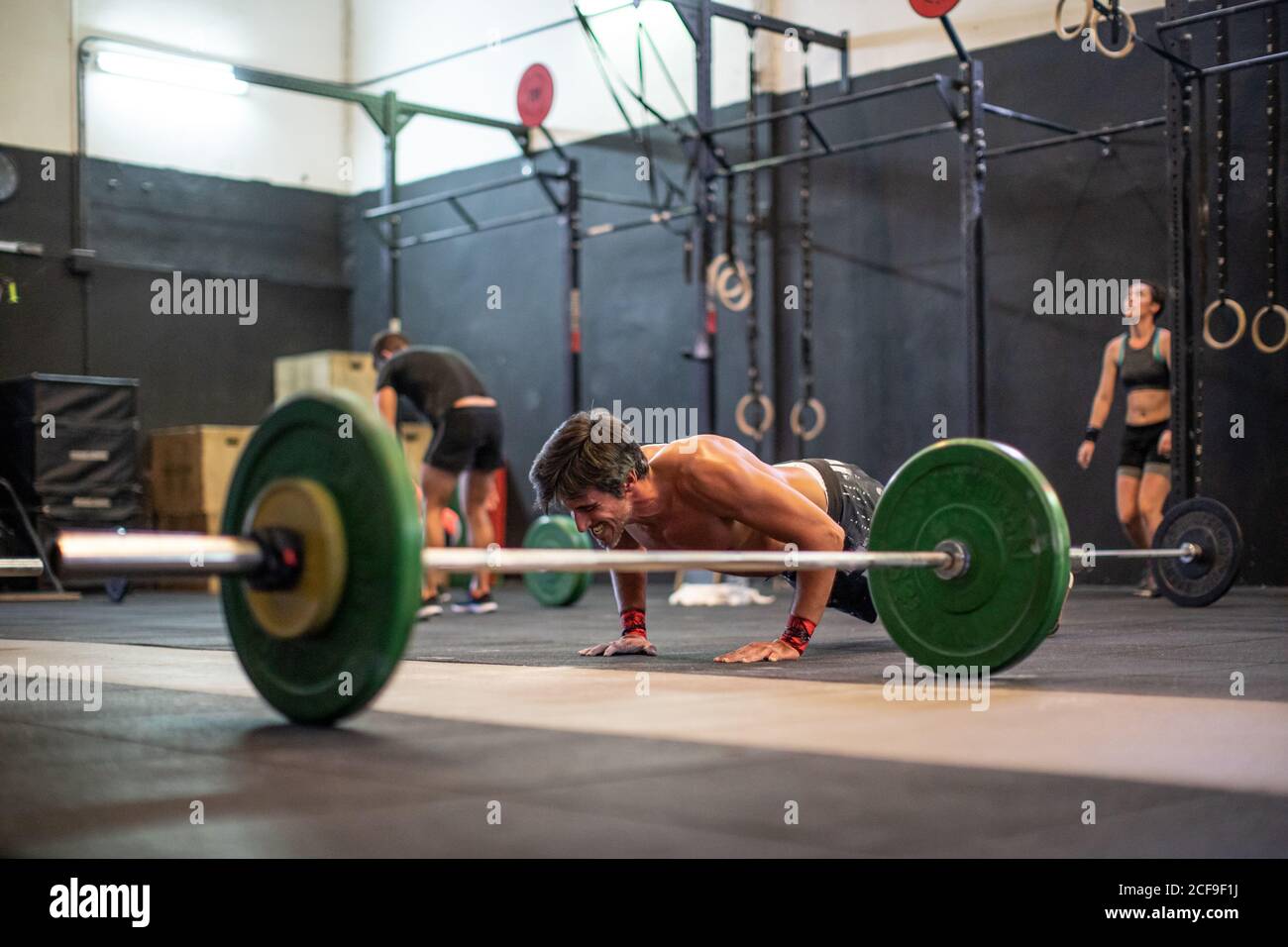 Fit man doing push-ups Stock Photo